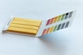 Litmus pH test and color scale Royalty Free Stock Photo