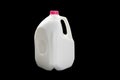 A 4 Litres milk jug on a black background Royalty Free Stock Photo