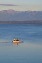 A litte boat and the fishermen on the lake Paliastomi. Poti. Georgia