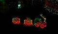 Litte Toy Train in Christmas Lights Royalty Free Stock Photo