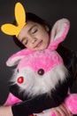 Littel girl with easter stuffed toy