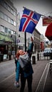 Littelgirl trying catch Icelandic flag