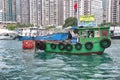 A litter collection boat on the water in Hong Kong Royalty Free Stock Photo