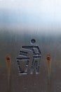 Litter symbol on a old metal rusty surface on a bin outdoor. Keep nature clean concept