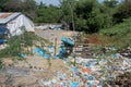 Littering of garbage in front of private houses along colombian coast, Santa Marta, Columbia