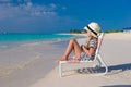 Little adorable girl in beach chair during Royalty Free Stock Photo