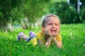 Little adorable girl lying on grass Royalty Free Stock Photo