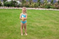 Little adorable girl playing with water gun Royalty Free Stock Photo