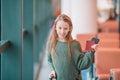 Little kid in airport waiting for boarding Royalty Free Stock Photo