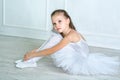 A little adorable young ballerina in a playful mood in the inter Royalty Free Stock Photo