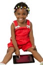 Little african american girl using tablet pc Royalty Free Stock Photo