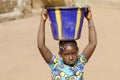 Little African Ethnic School Girl Holding Sink on her head - Wom