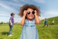 Little african girl in heart shaped sunglasses Royalty Free Stock Photo