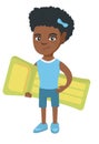 Little african girl holding inflatable mattress. Royalty Free Stock Photo