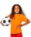 Little African girl holding soccer ball isolated Royalty Free Stock Photo