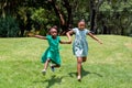 Little African girls running in the garden Royalty Free Stock Photo