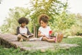 Little child reading with friend Royalty Free Stock Photo