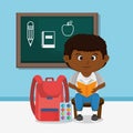 Little afro schoolboy with chalkboard Royalty Free Stock Photo