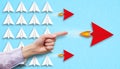 Little airplanes and a hand pointing to a red one symbolizing a different approach