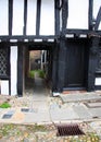 A narrow Alleyway Between Old Tudor Buildings