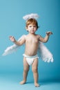 Little angel on blue background