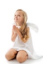 Little angel looking up gratefully Royalty Free Stock Photo