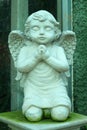 Little Angel Statue Decorated in the Garden Royalty Free Stock Photo