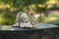 A little angel on the tombstone