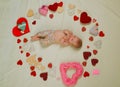 Little angel for valentine. Family. Child care. Small girl among red hearts. Love. Portrait of happy little child Royalty Free Stock Photo