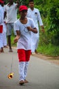 A little artist who spins fireballs in Sri Lanka's perahara.