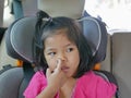 Little Asian baby girl picking her nose - child habit / behavior Royalty Free Stock Photo