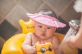 Little asian babe is having fun in the shower Royalty Free Stock Photo