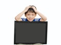 Little Asian boy holding empty chalkboard Royalty Free Stock Photo