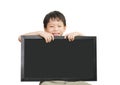 Little Asian boy holding empty chalkboard Royalty Free Stock Photo