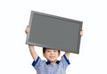 Little Asian boy holding empty chalkboard Royalty Free Stock Photo