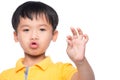 Little asian boy showing his lost milk-tooth in his hand - close Royalty Free Stock Photo