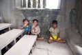 Little asian boys posing in Angkor Wat temple