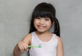 Little asian cute girl brush teeth