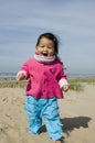 Little asian girl at the beach Royalty Free Stock Photo