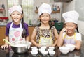 Little asian girl making cotton wool cake Royalty Free Stock Photo