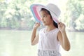 Little Asian Girl outdoors in summer hat Royalty Free Stock Photo