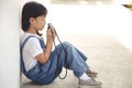 Little Asian girl praying with holding the cross, Christian concept Royalty Free Stock Photo