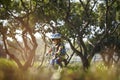 Little asian girl riding bike outdoors in city park Royalty Free Stock Photo