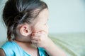 Little girl screathing at her face because insect bites Royalty Free Stock Photo