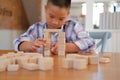 little asian kid boy child children schoolboy playing wood block