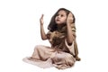 Little asian muslim girl raising hand and praying Royalty Free Stock Photo