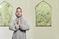 Little asian muslim kid with veil praying to go Royalty Free Stock Photo