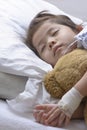 Little Asian Thai Girl, Recovering Sleep on white patient Bed