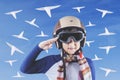 Little aviator with helmet and paper planes