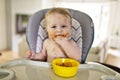 A Little baby eating her dinner and making a mess Royalty Free Stock Photo